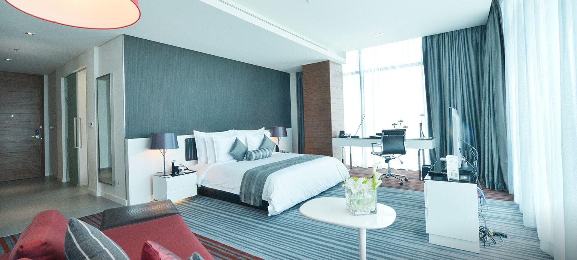 Ramee Grand Hotel And Spa Μανάμα Εξωτερικό φωτογραφία A bedroom in a hotel