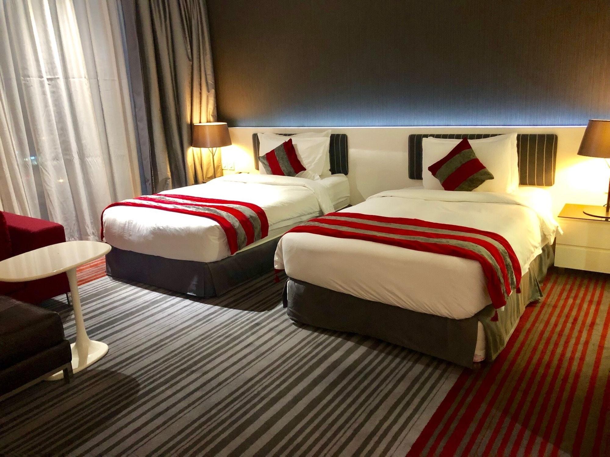 Ramee Grand Hotel And Spa Μανάμα Εξωτερικό φωτογραφία A room at the hotel
