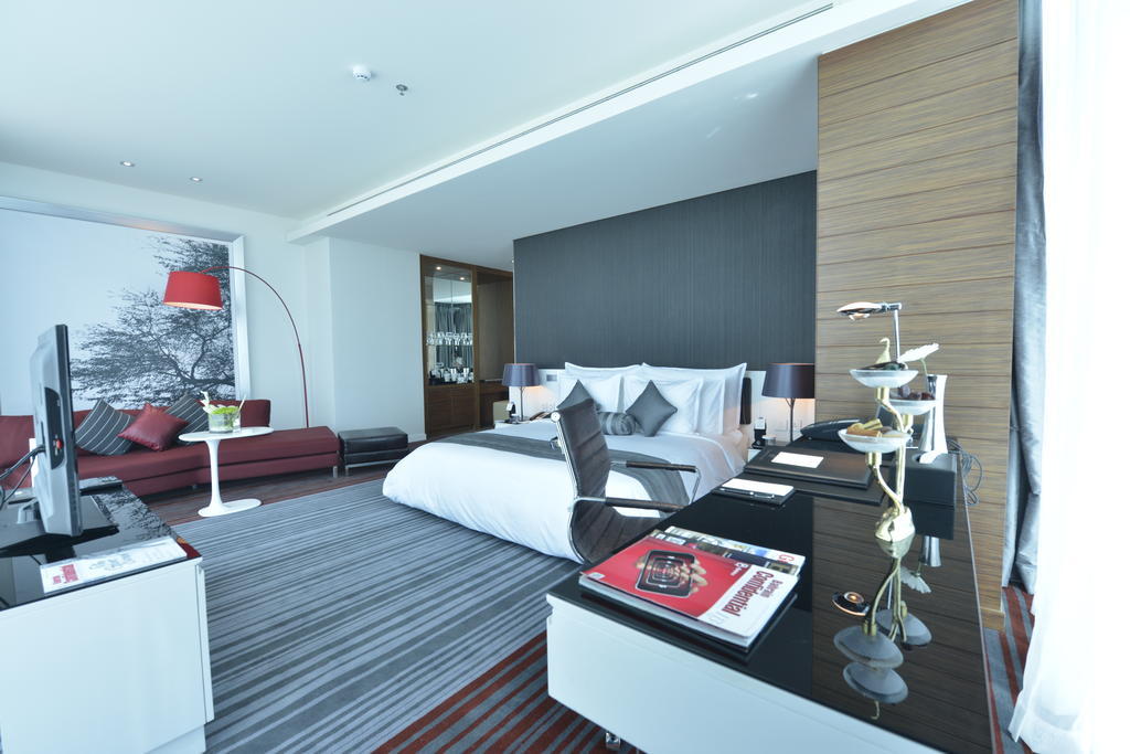 Ramee Grand Hotel And Spa Μανάμα Δωμάτιο φωτογραφία A bedroom at the hotel